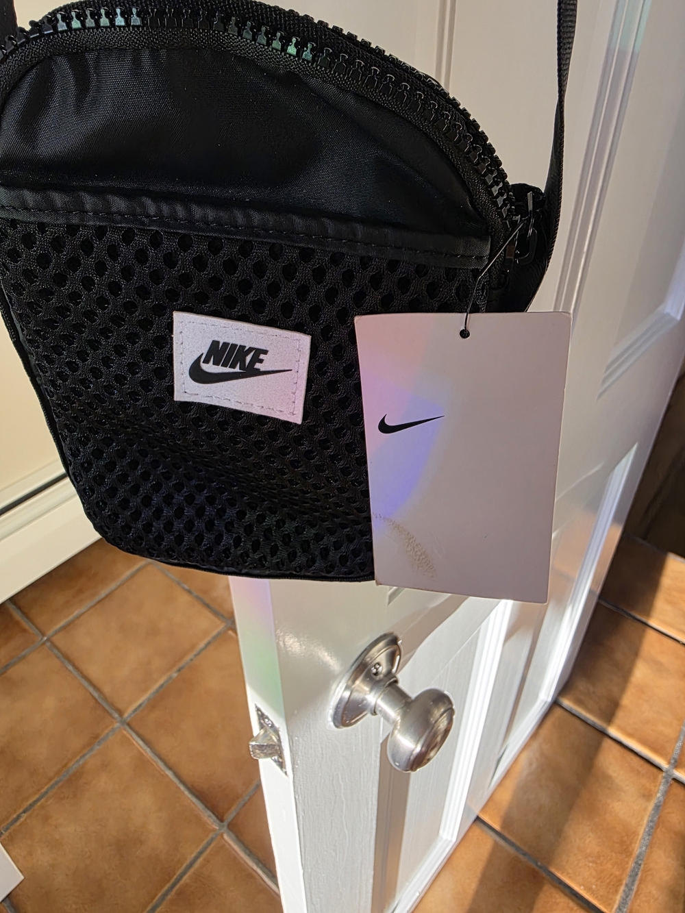 Nike White Retail Tag with Black Text